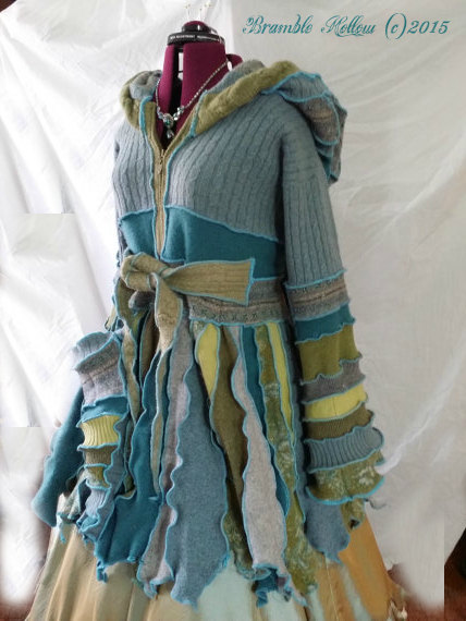 mermaid inspired sweater coat, with sculpted pixie point hem and bell sleeves